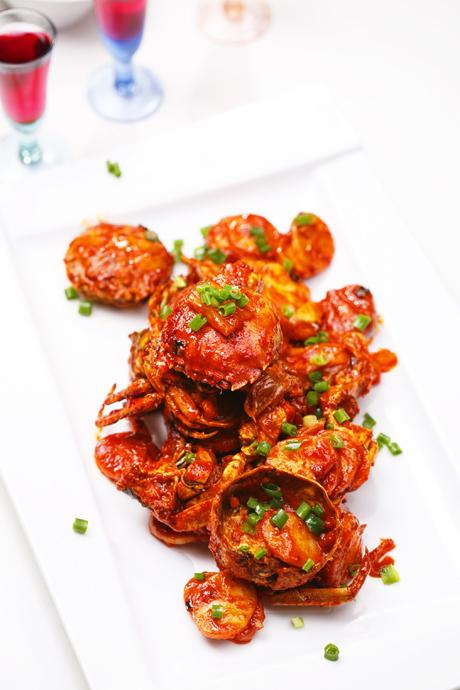 螃蟹辣白菜炒年糕的做法